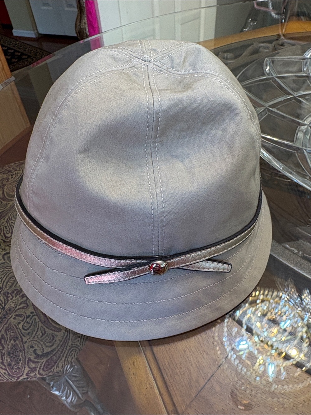 Coach bucket HAT featuring a brown leather "Coach est. 1941" interior patch